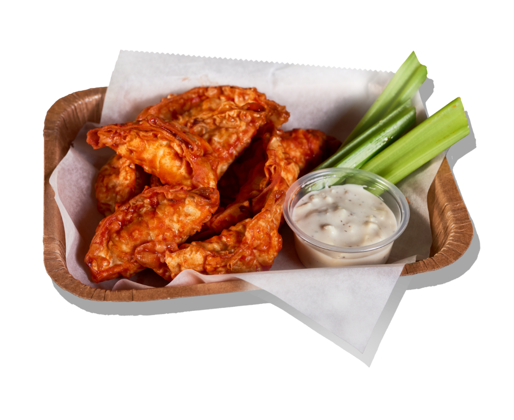 Buffalo chicken dumplings with celery and ranch dip