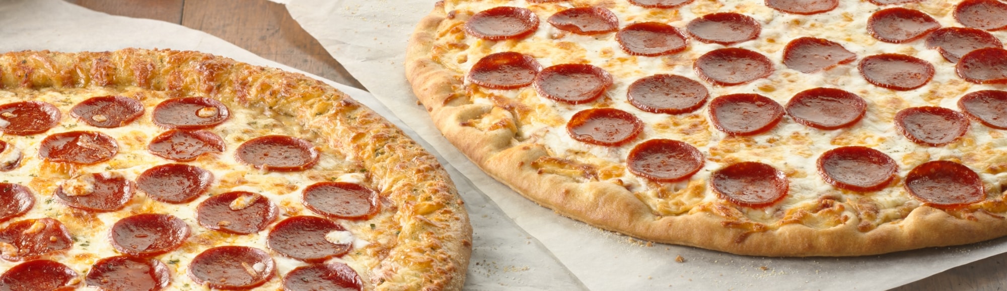two pepperoni pizzas