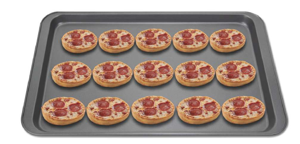personal-size pepperoni pizzas on a cookie sheet