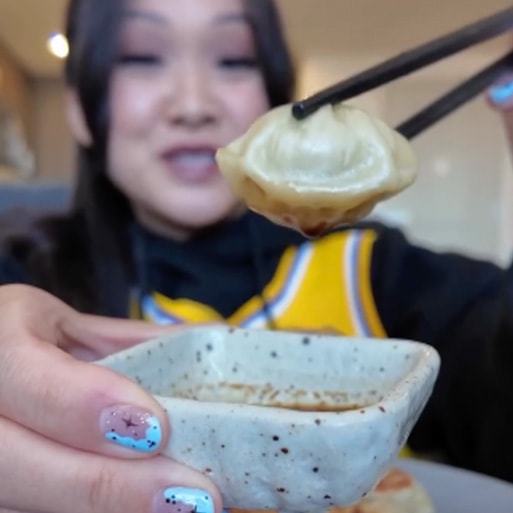 TikTok influencer with steamed dumplins